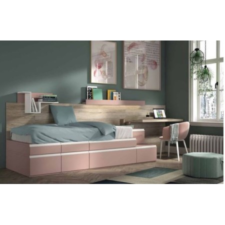 Dormitorio juvenil en tonos rosa con baúl