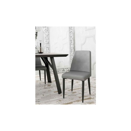 Pack de 4 sillas de comedor tapizadas en cuatro acabados con patas metálicas